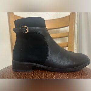 Black Genuine leather/suede zipper ankle booties.